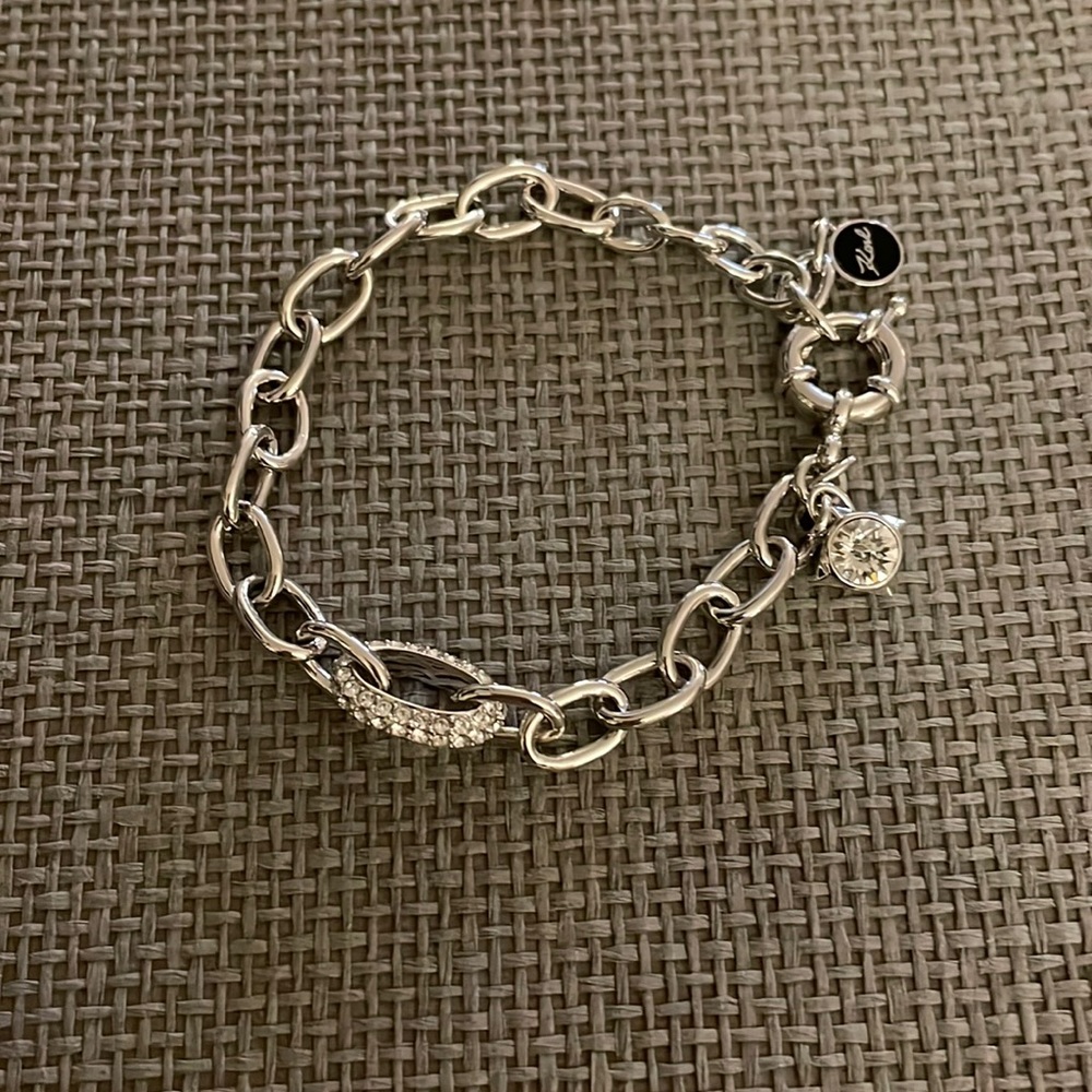 Karl Lagerfeld collaboration with Adore by Swarovski.Pave and large crystals.